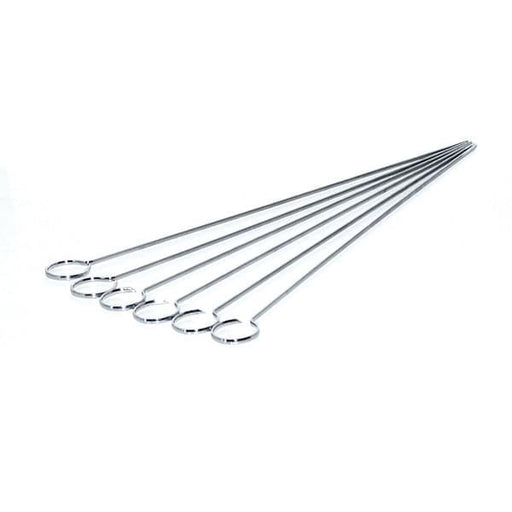 Stainless steel kabob skewers loaded with meat and vegetables on a grill