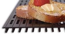 Smooth side of the reversible anodized aluminum SearMagic cooking grid